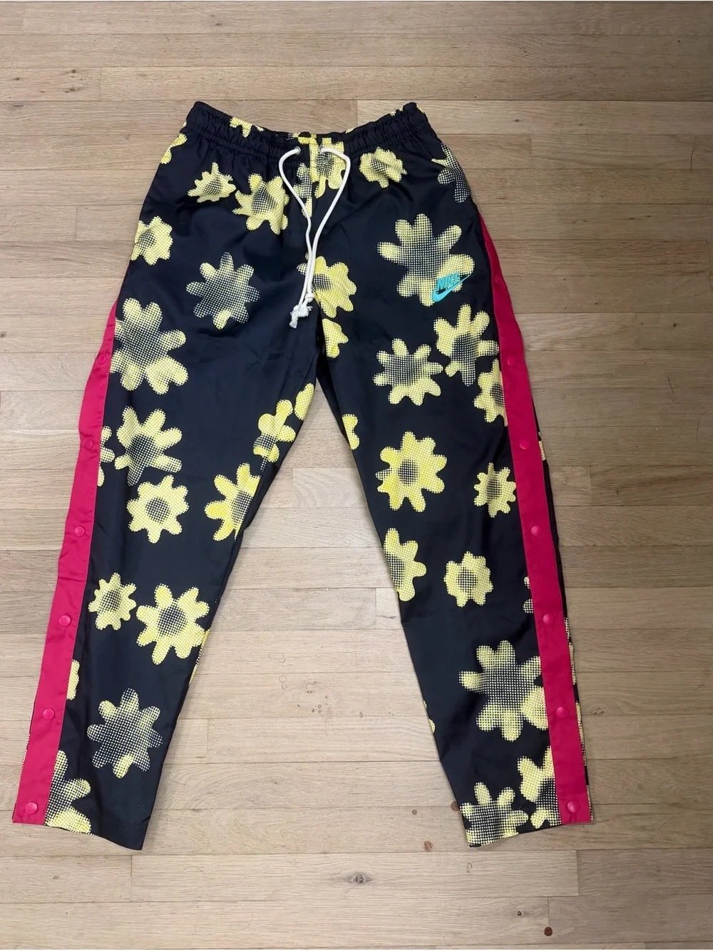 Nike Black Floral Track Pants with Yellow Print and Pink Side Stripe